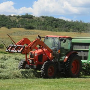 Mix and match; Kubota M126GX with John Deere 567 baler.